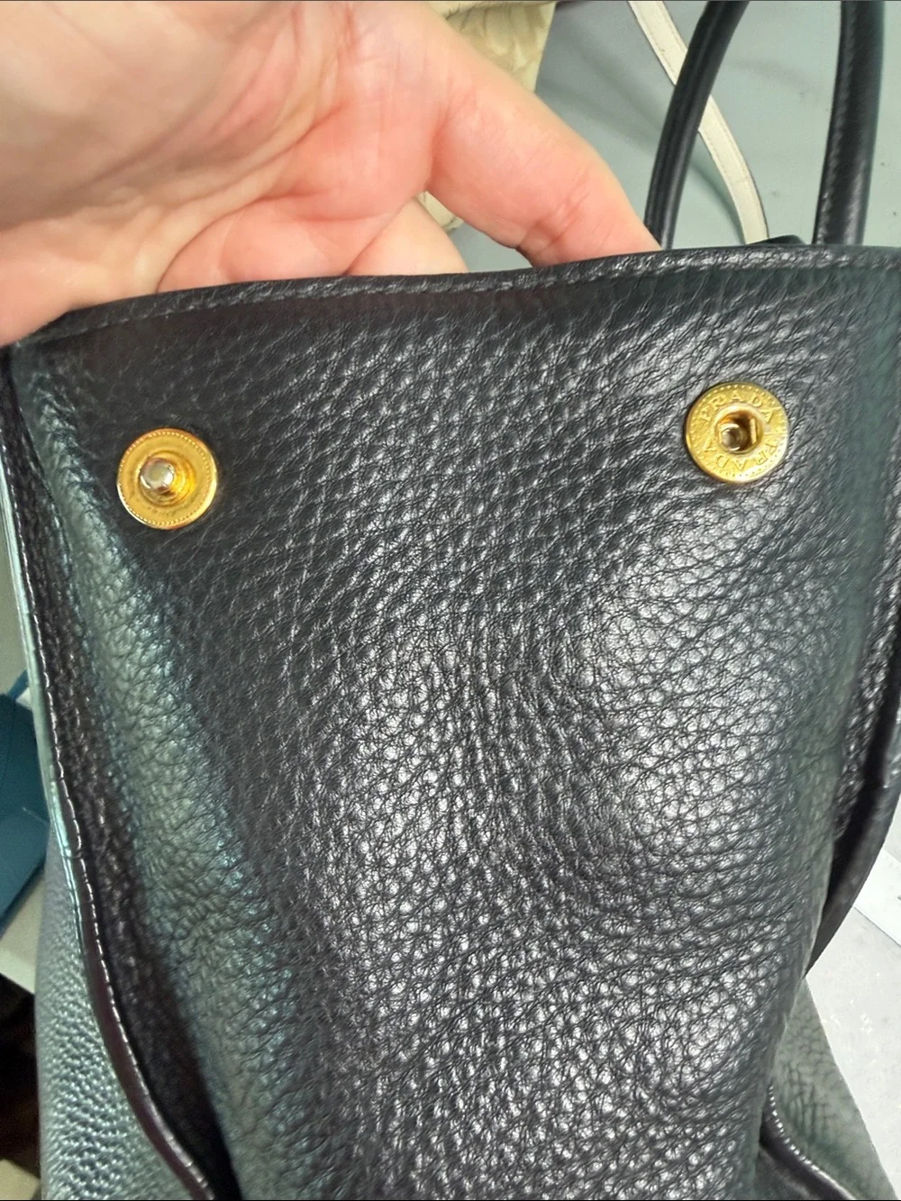 Authentic Prada Black  Leather Satchel with Gold Logo .